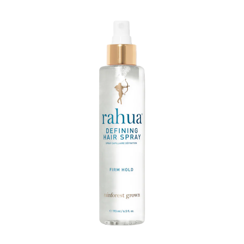 Bottle of rahua defining hair spray on a white background.