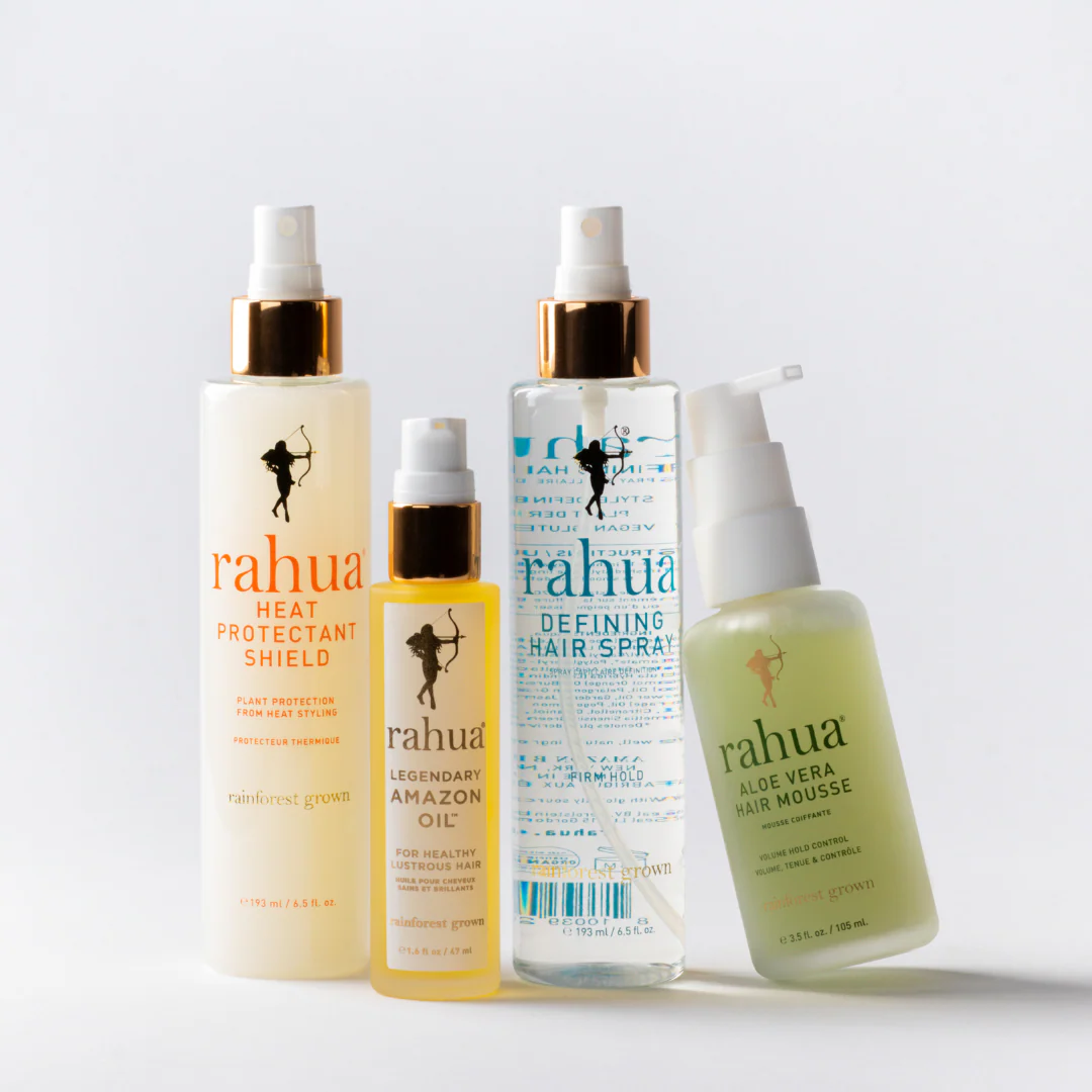 Four Rahua hair care products on a white background.