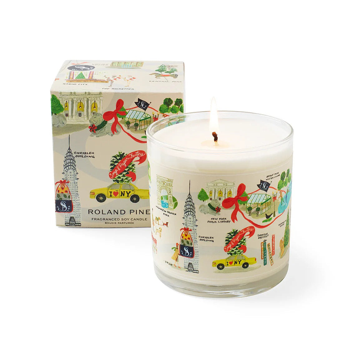 Roland Pine Candle with decorative label and matching box on a white background