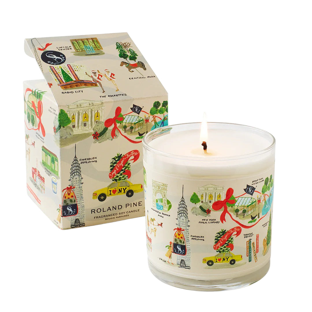 Roland Pine Candle with decorative label and matching box on a white background