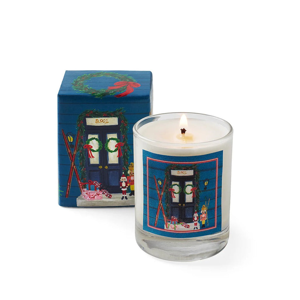 Roland Pine Candle with a decorative label next to its box on a white background