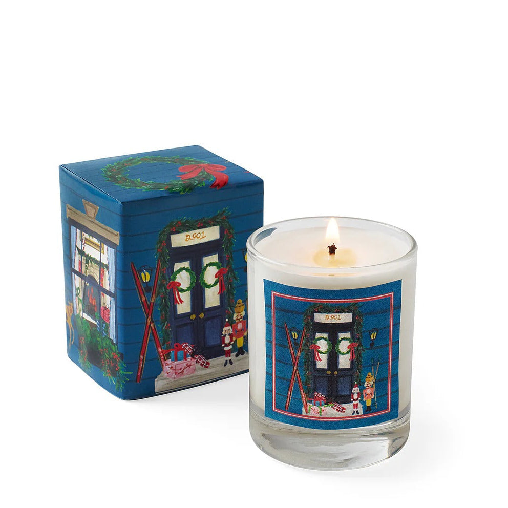 Roland Pine Candle with a decorative label next to its box on a white background