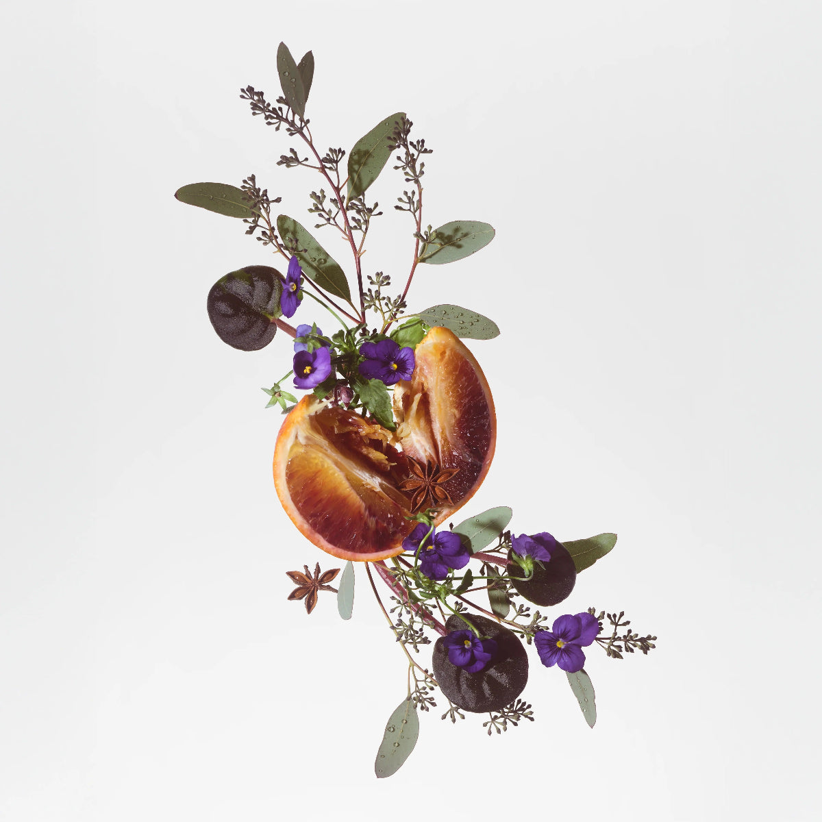 Decorative arrangement with flowers on a light gray background