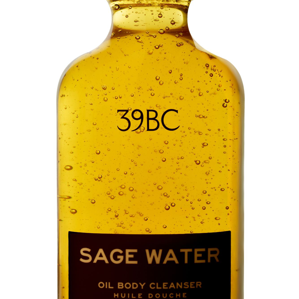Close up of a bottle of 39BC Sage Water Oil Body Cleanser on a white background