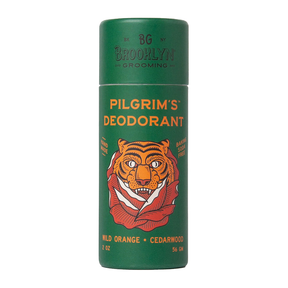Green deodorant can with tiger illustration and 'BG Brooklyn Grooming' branding on a white background