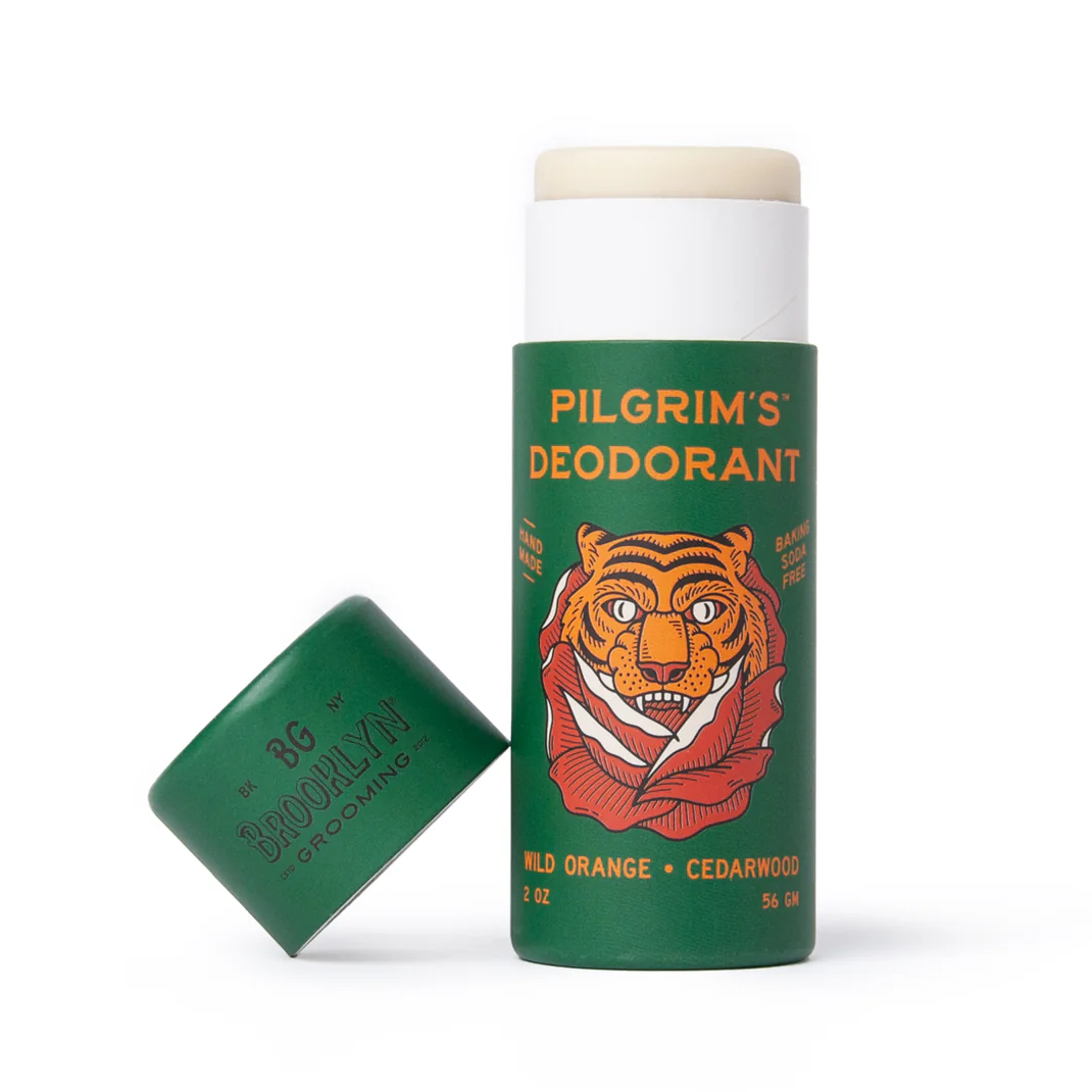 Green deodorant stick with tiger design on a white background