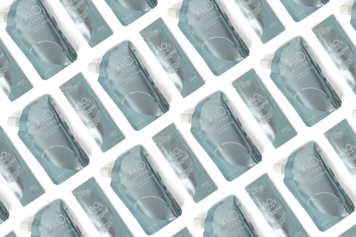 Multiple blue pouches with a brand logo on a white background