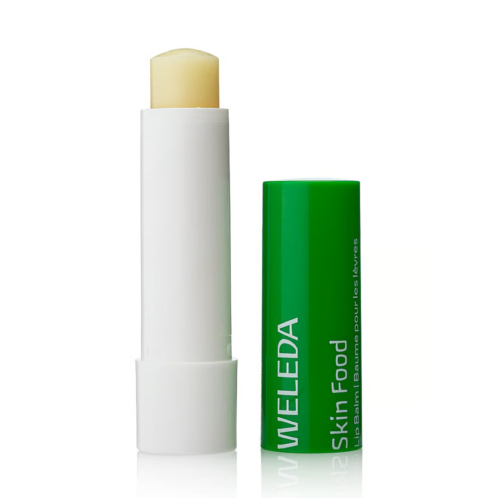 Weleda lip balm with green packaging on a white background