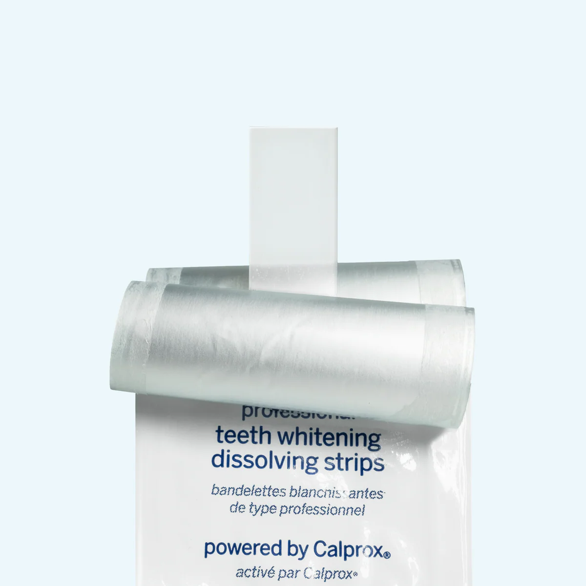 Teeth whitening dissolving strips packaging on a light blue background