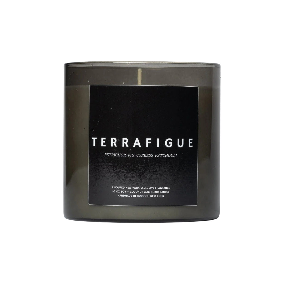 Black candle with 'TERRAFIGUE' label on a white background