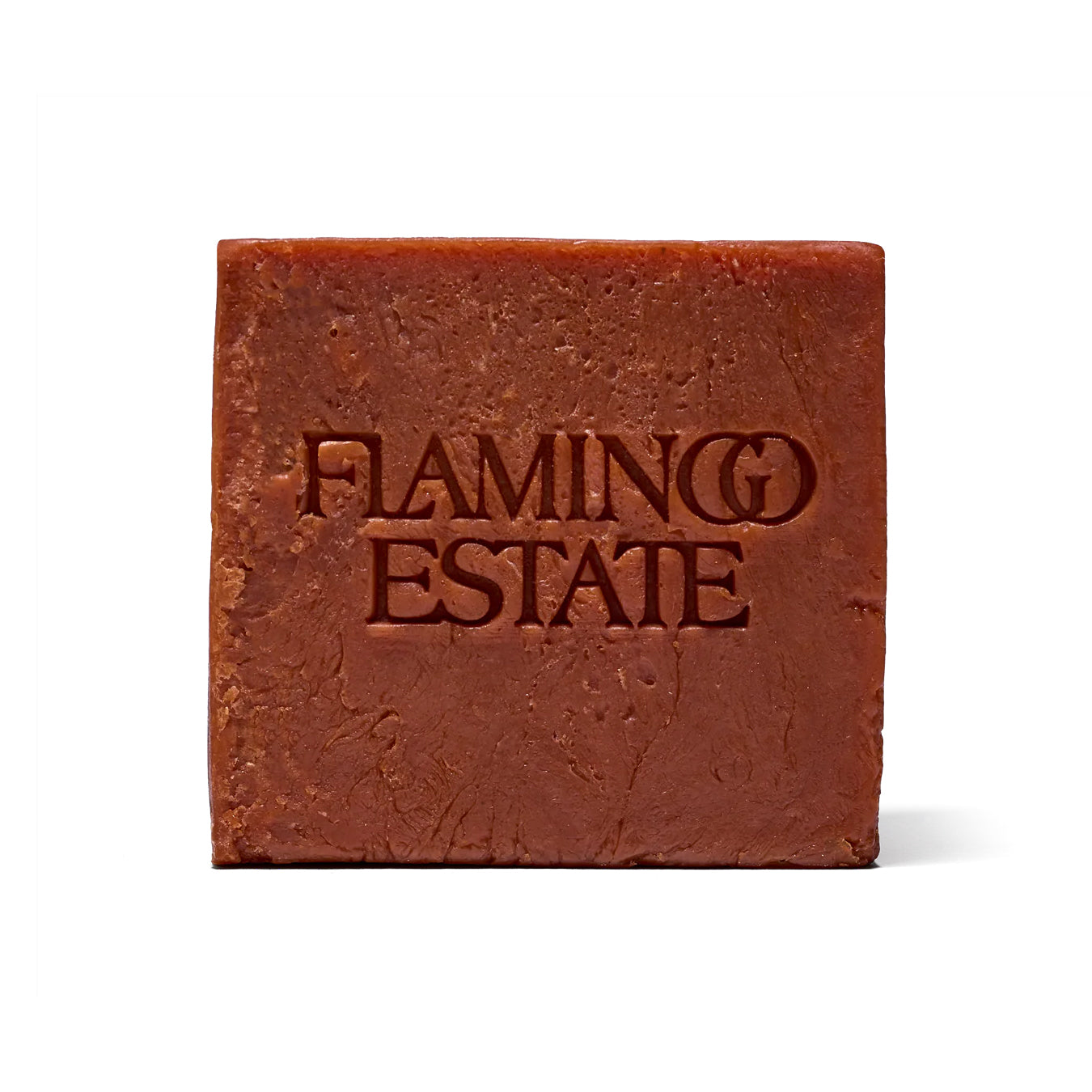 Tomato Brown bar of soap with 'Flamingo Estate' branding on a white background