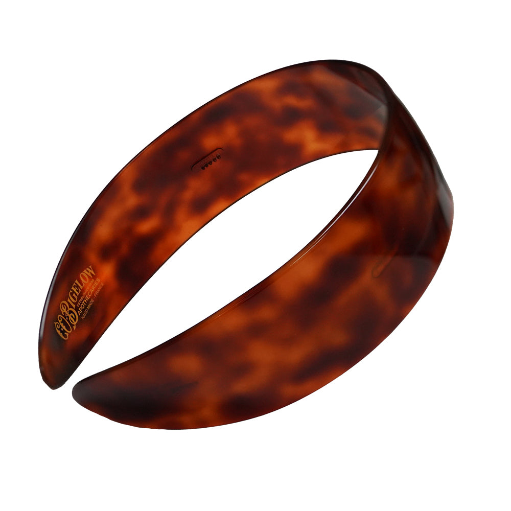 C.O. Bigelow Branded Charles Wahba Tortoise Headband on a white background. 