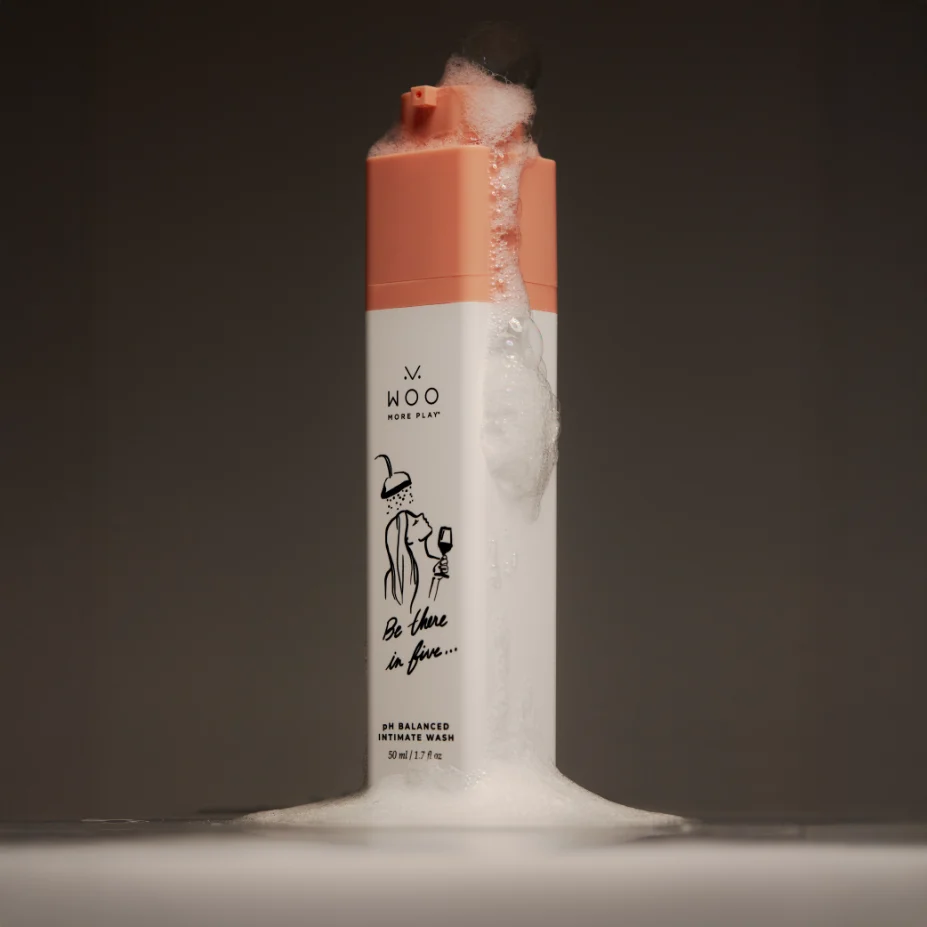 A bottle of Woo More Play ph Balanced Intimate Wash