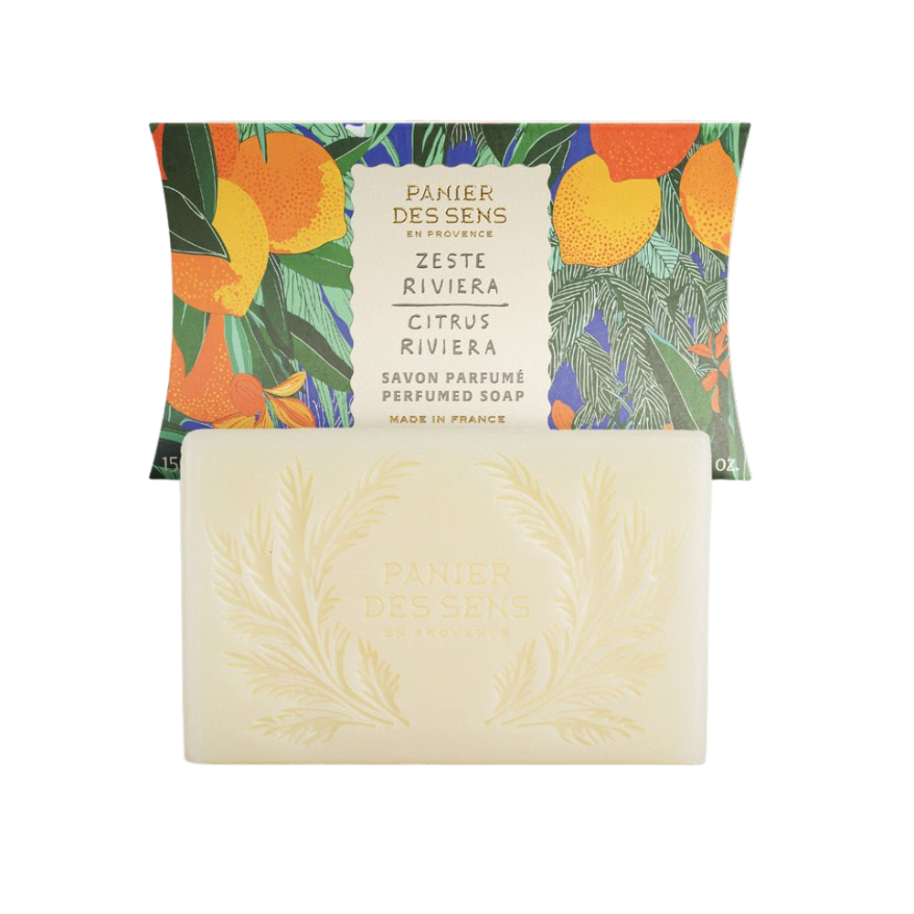 Citrus Riviera Bar of soap with a colorful packaging featuring oranges and leaves on a white background.