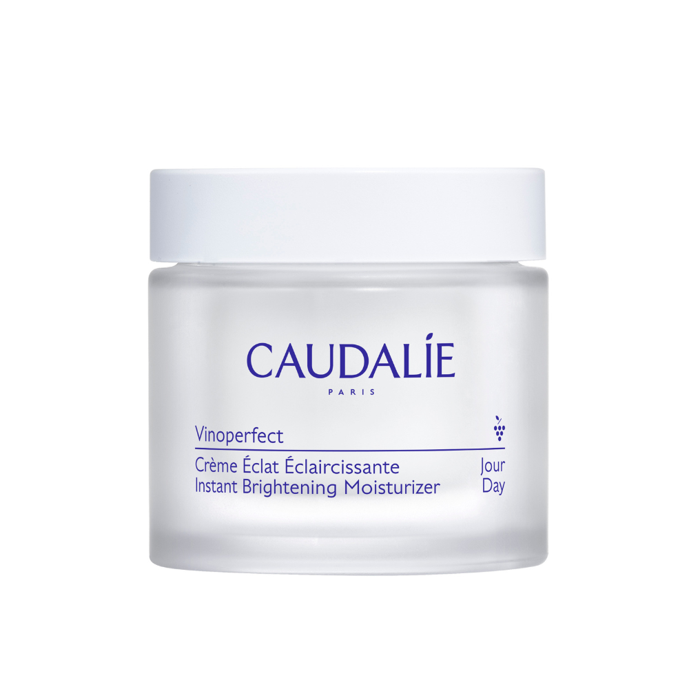 Caudalie skincare jar on a white background