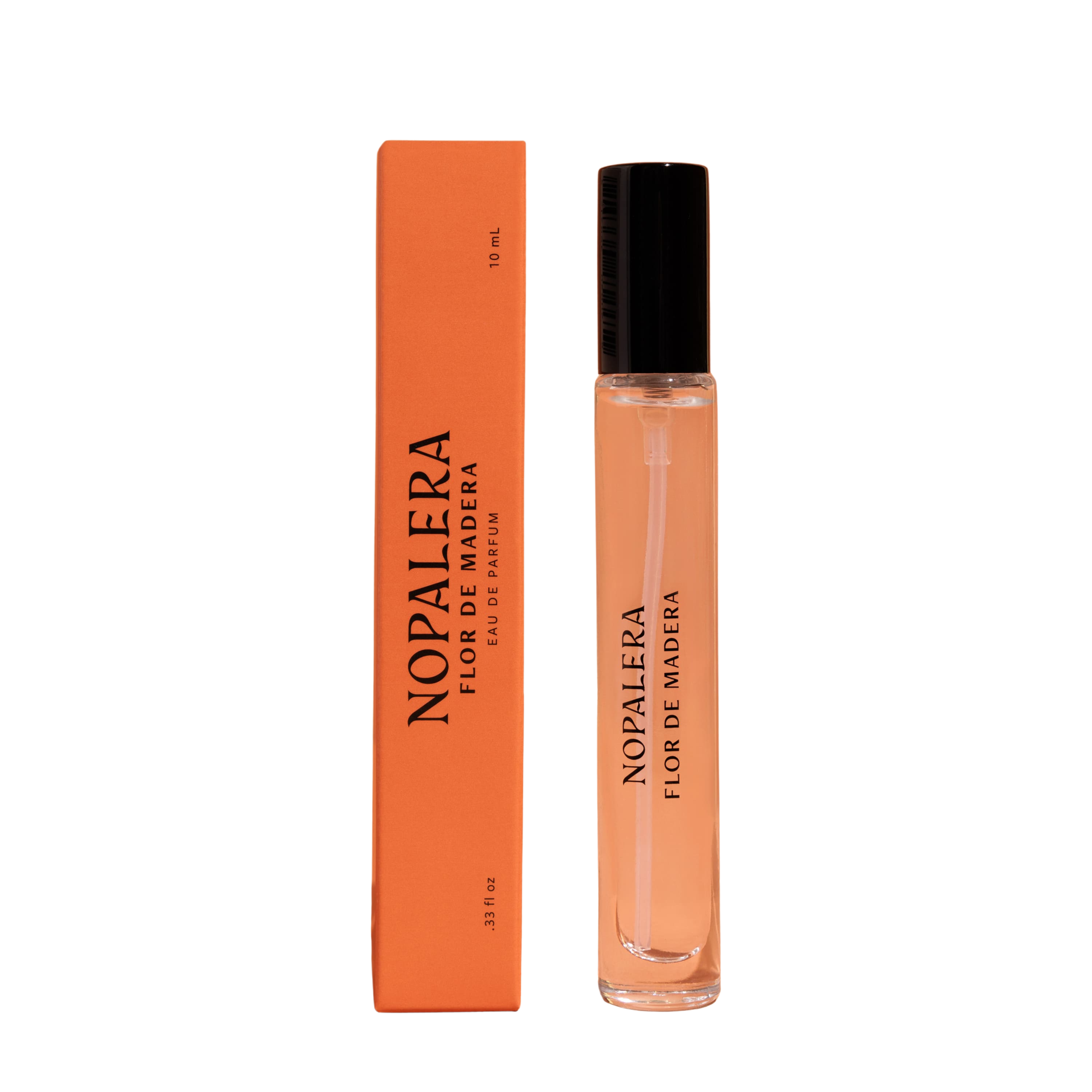Nopalera Flor de Madera perfume rollerball bottle next to its orange cardboard packaging box, on a solid white background.