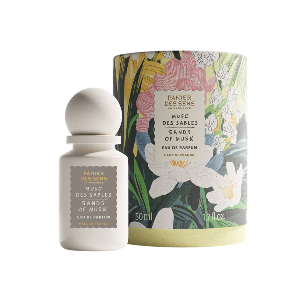 Sands of Musk perfume bottle and packaging with floral design on a white background