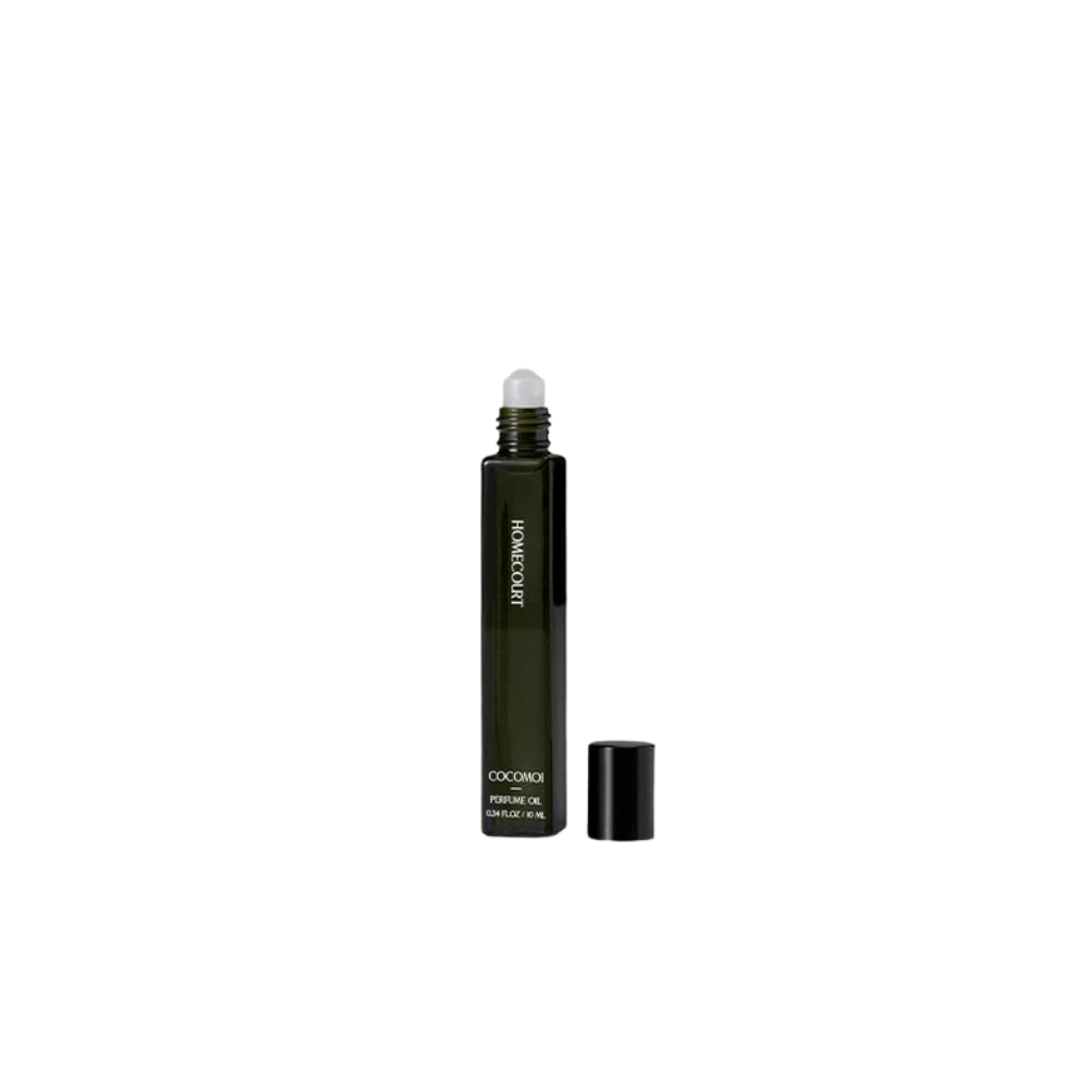 Black rollerball bottle with white cap on a white background
