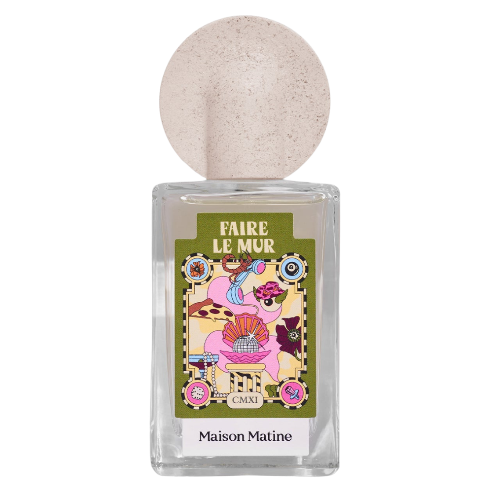 Maison Matine Perfume bottle with decorative label and beige cap on a white background