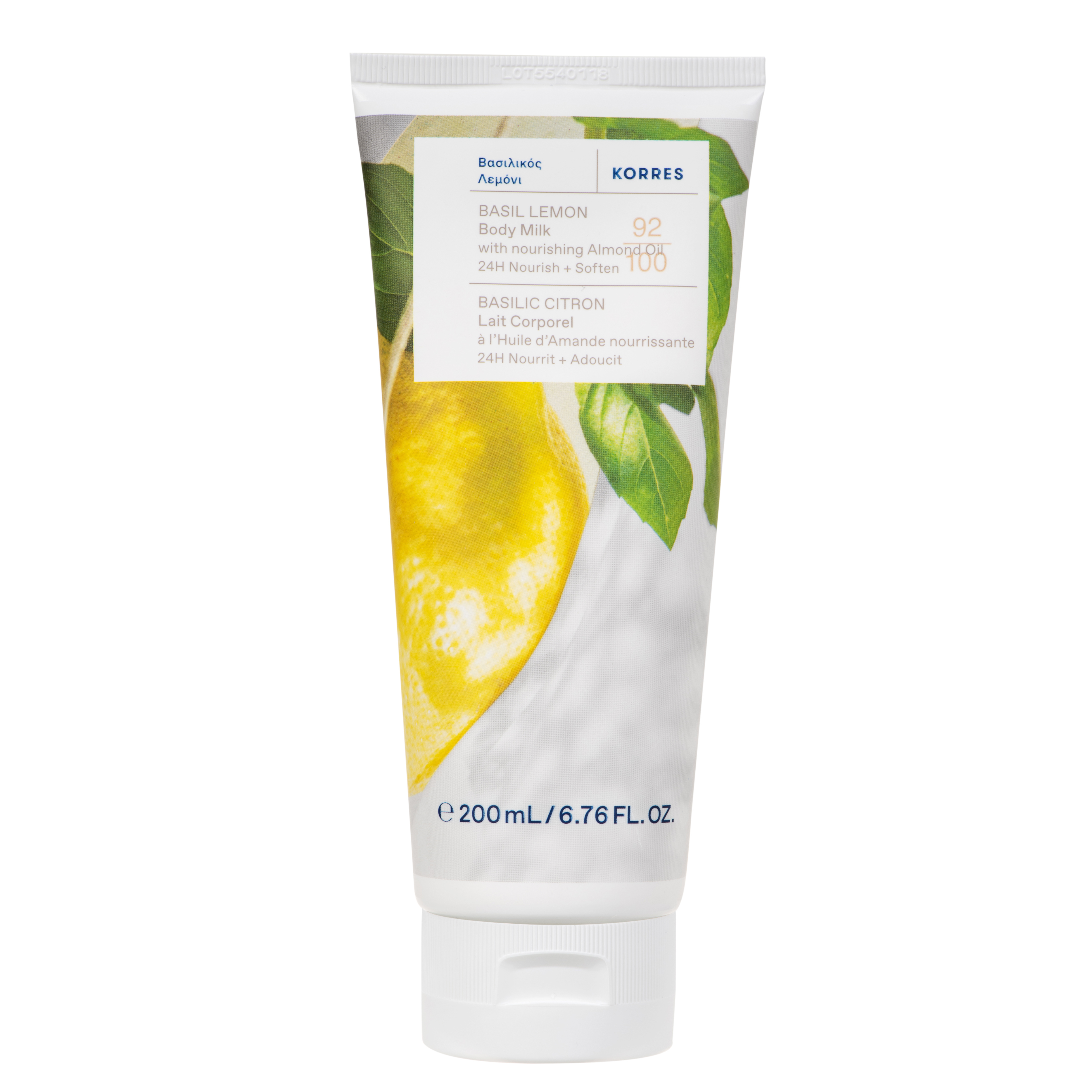A 200 mL squeeze tube of KORRES Basil Lemon Body Milk, featuring a white and yellow lemon graphic on the label, set against a plain white background.
