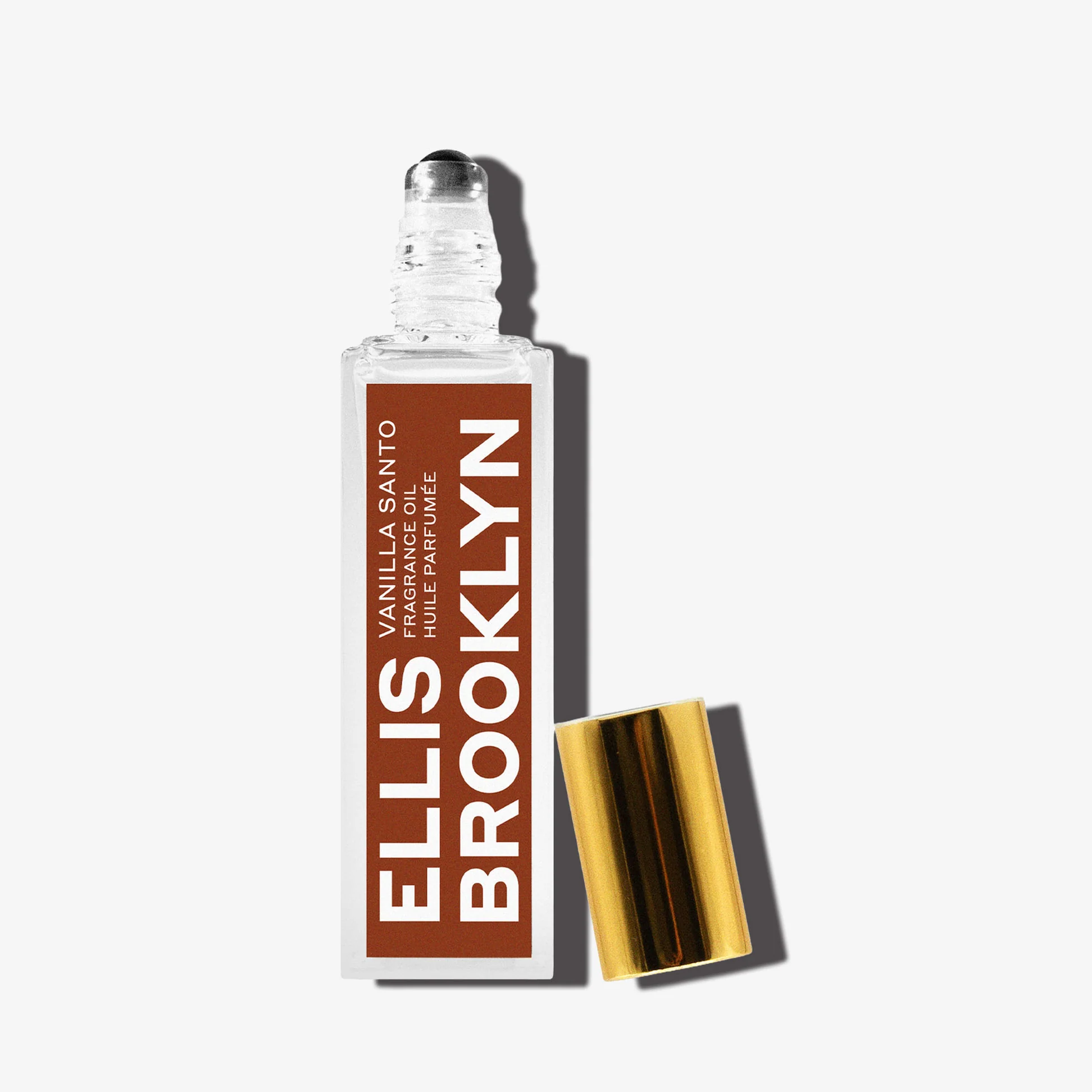 Ellis Brooklyn Vanilla Santo bottle with dramatic lighting on a white background