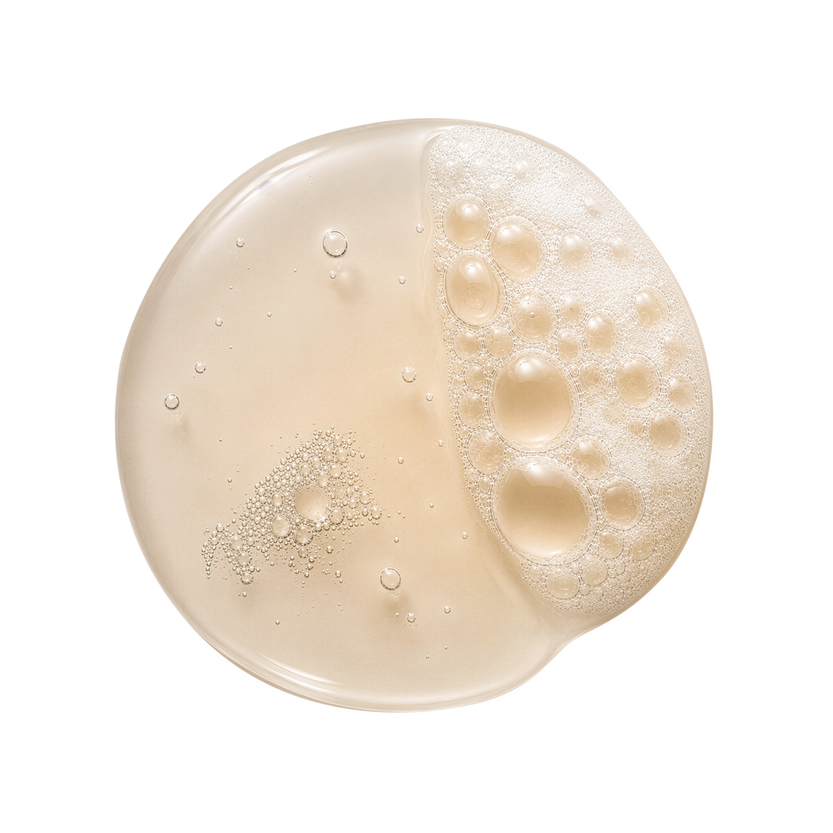 A round, translucent cosmetic gel or serum droplet with a creamy beige tint and a textured, bubbly surface, isolated on a solid white background.