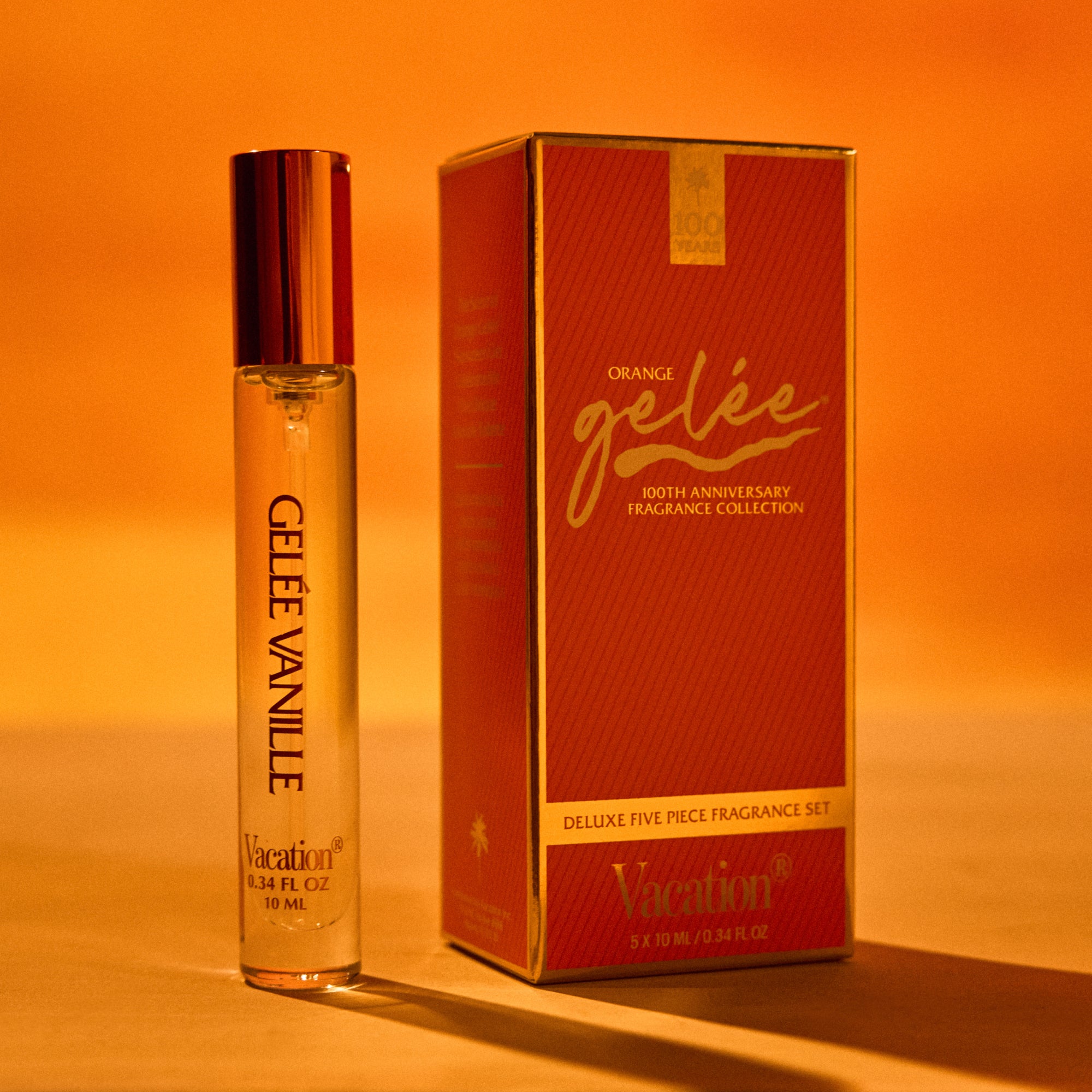 Perfume bottle and packaging of Orange Gelee Vanille on an orange background