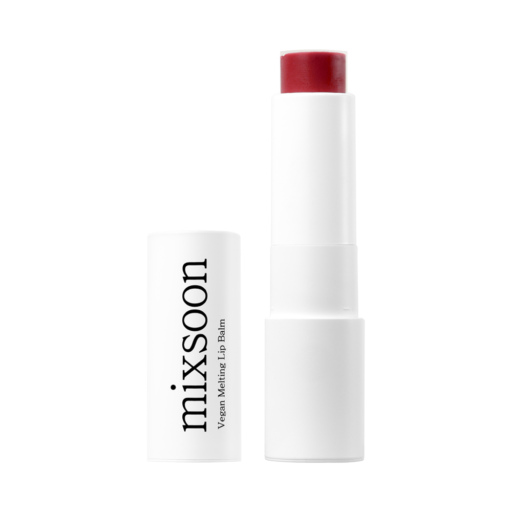 A white cosmetic tube of mixsoon Vegan Melting Lip Balm - Dry Rose with a red balm stick exposed, shown next to its white cap on a plain white background.