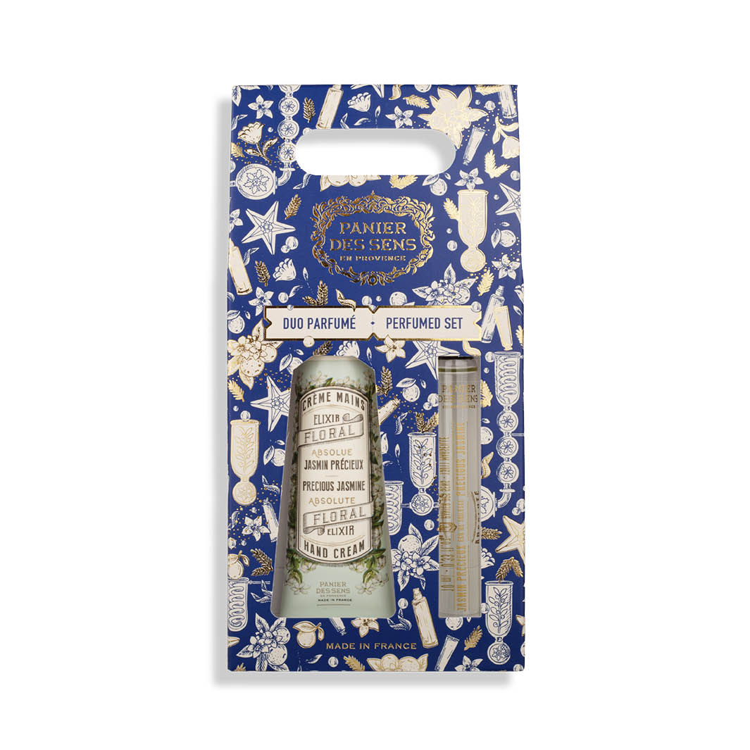 Jasmine perfume set packaging with floral and decorative design on a blue background