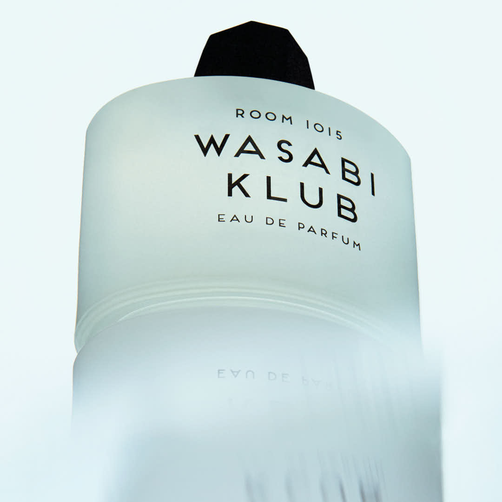 Room 1015 Wasabi Klub Eau De Parfum product on white background with reflection effect