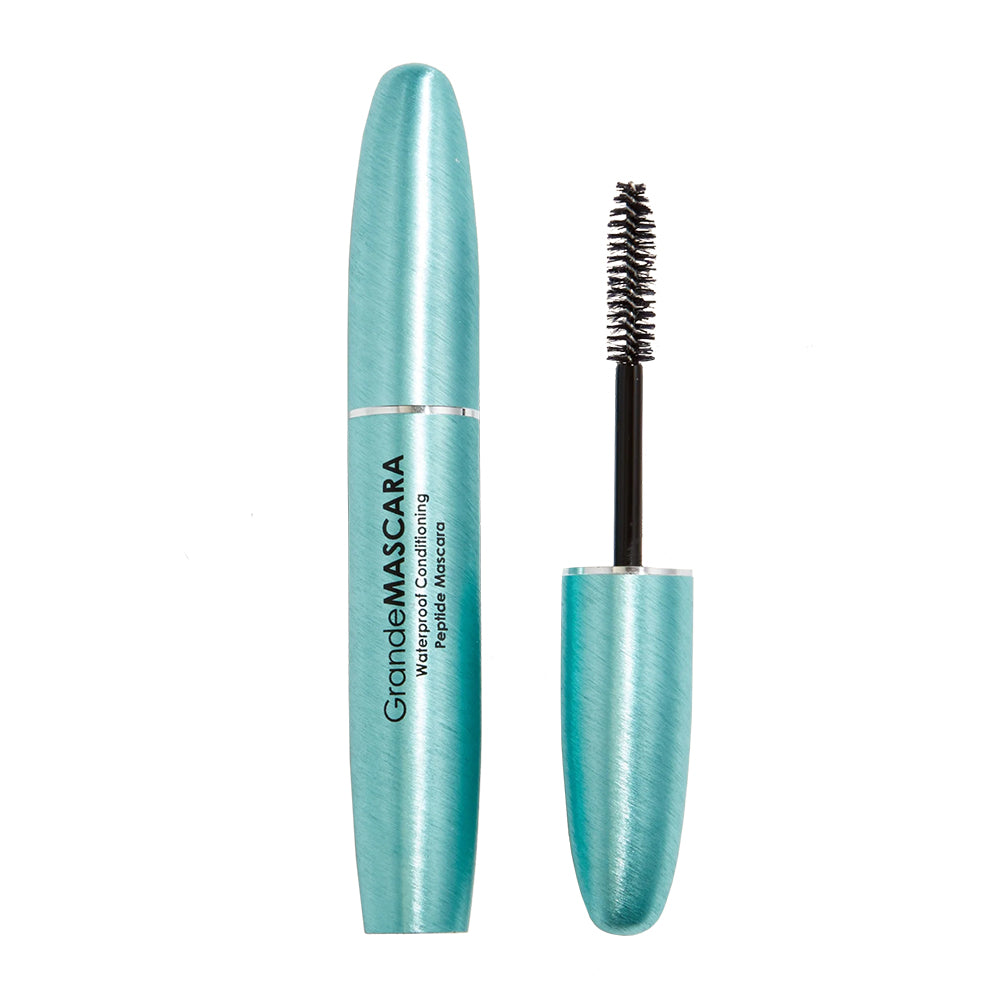 Turquoise mascara with open cap on a white background