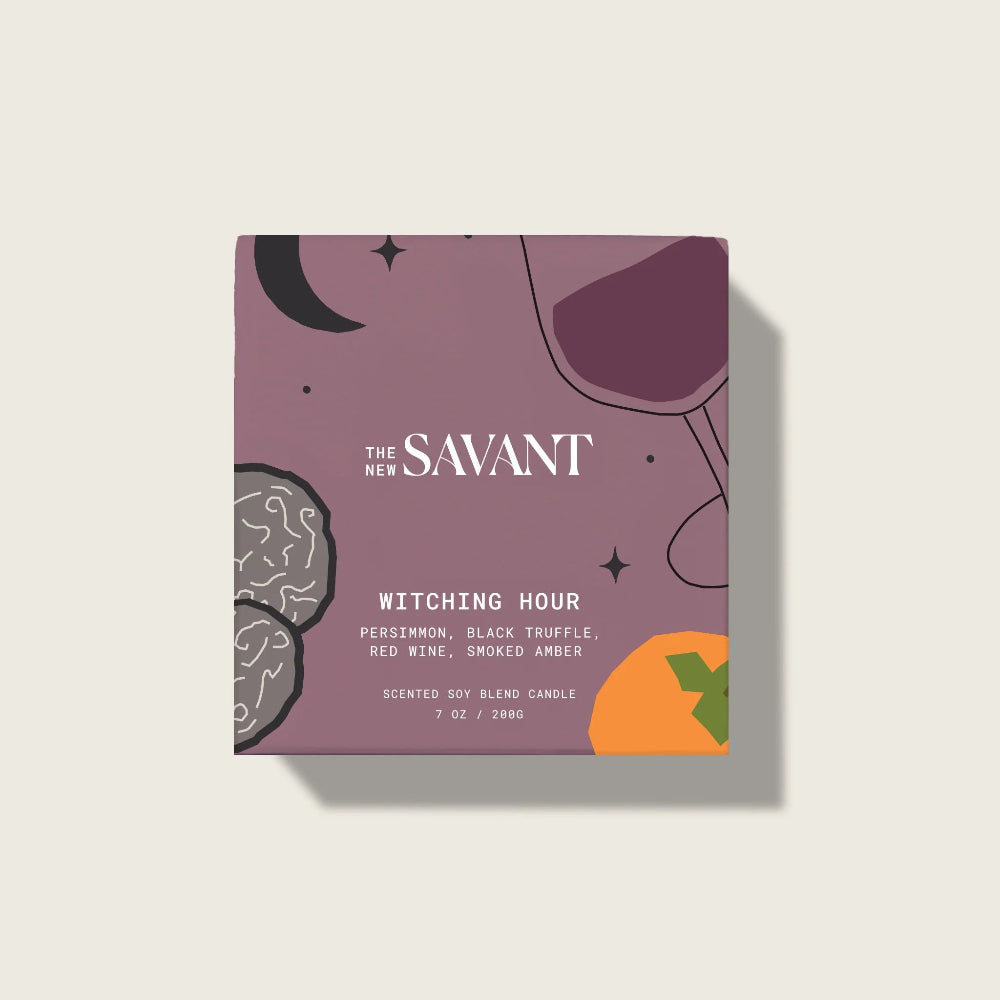 Candle packaging with 'The New Savant' branding on a light background