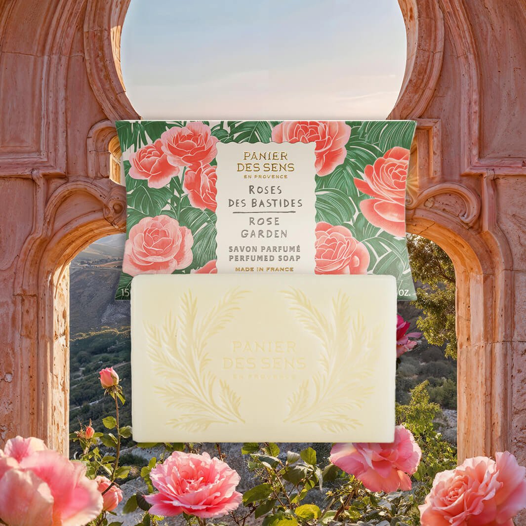 Panier Des Sens Bar of soap with packaging featuring roses against a scenic background