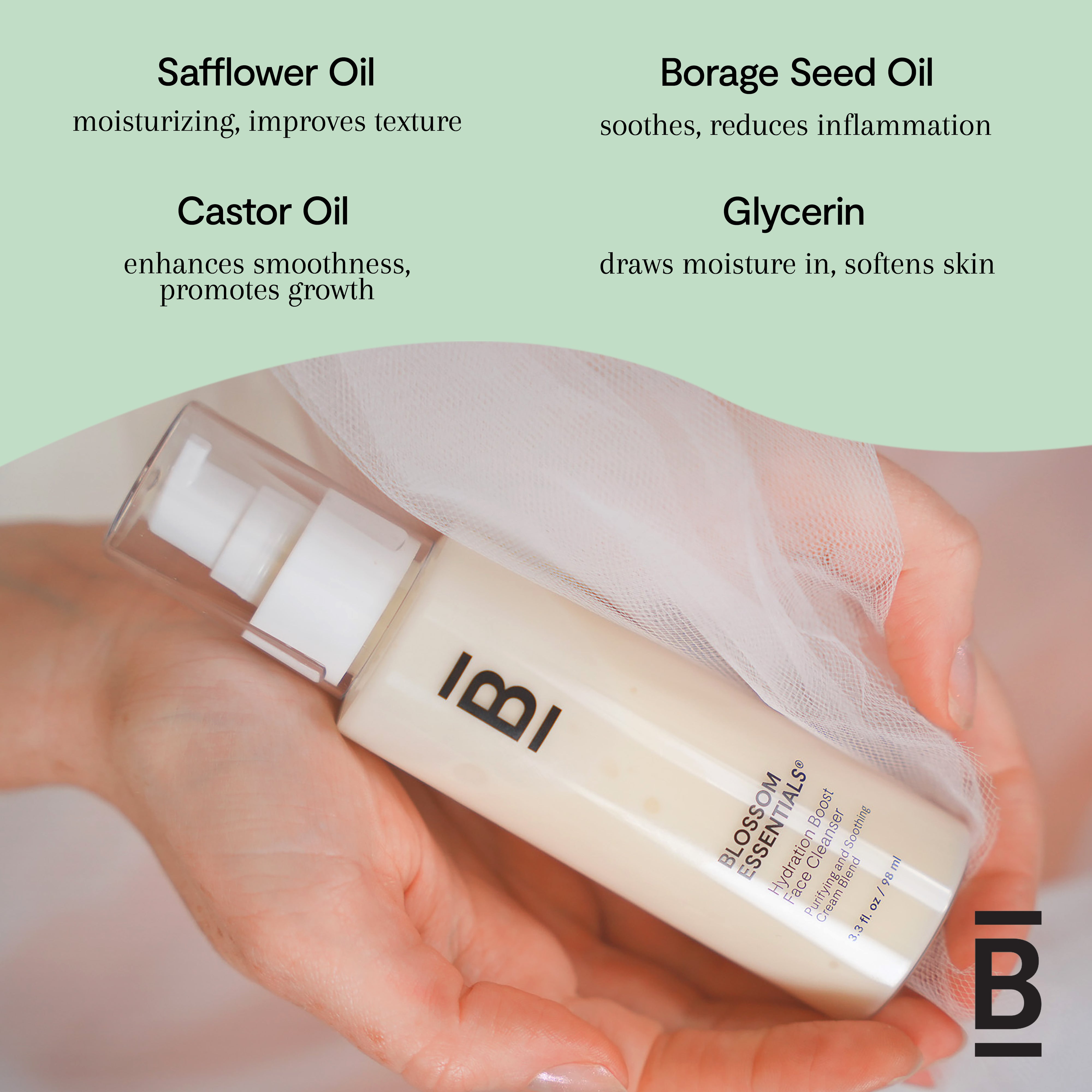 Hand holding a skincare product with oil names and benefits on a light green background