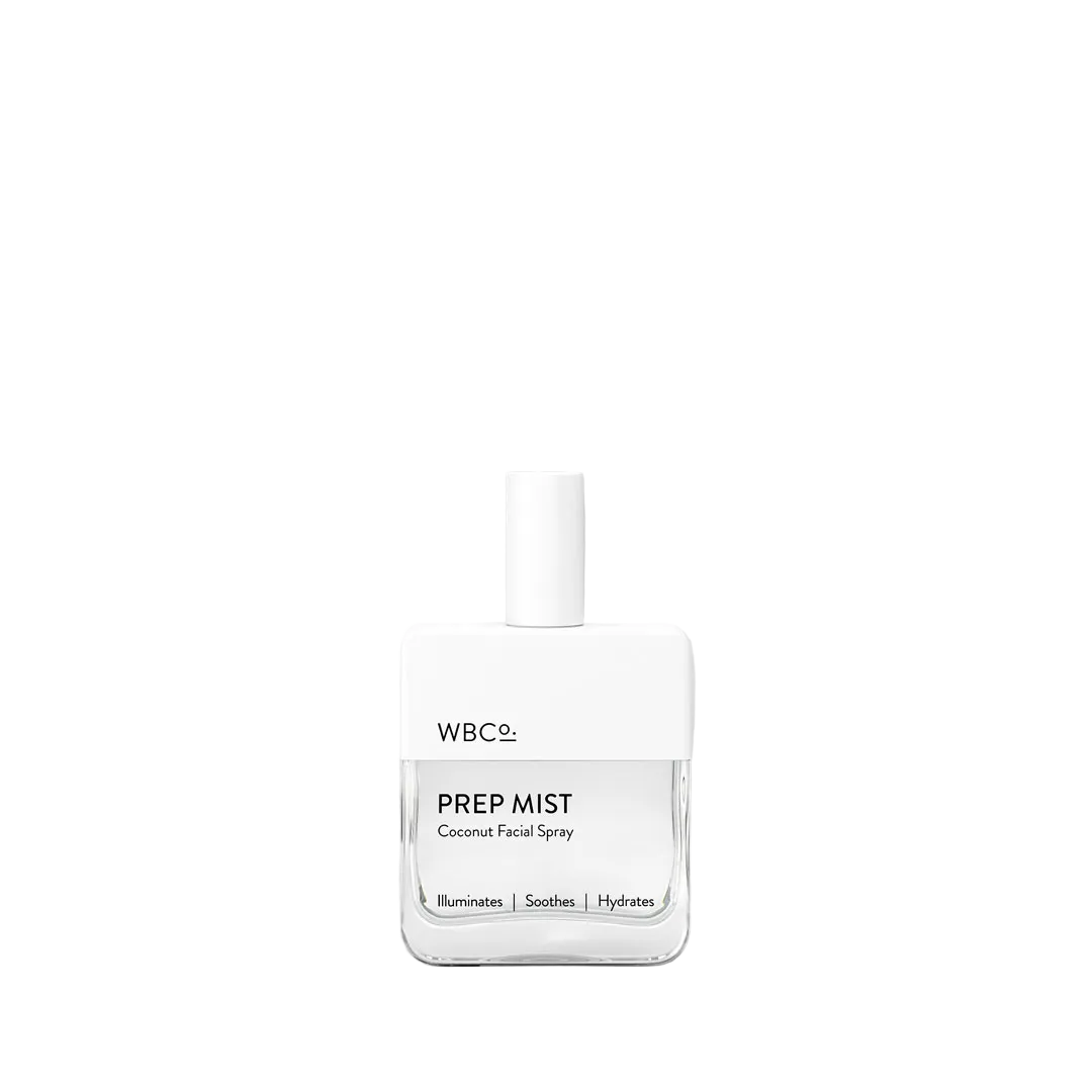 White facial spray bottle labeled 'WBCO. Prep Mist' on a light gray background