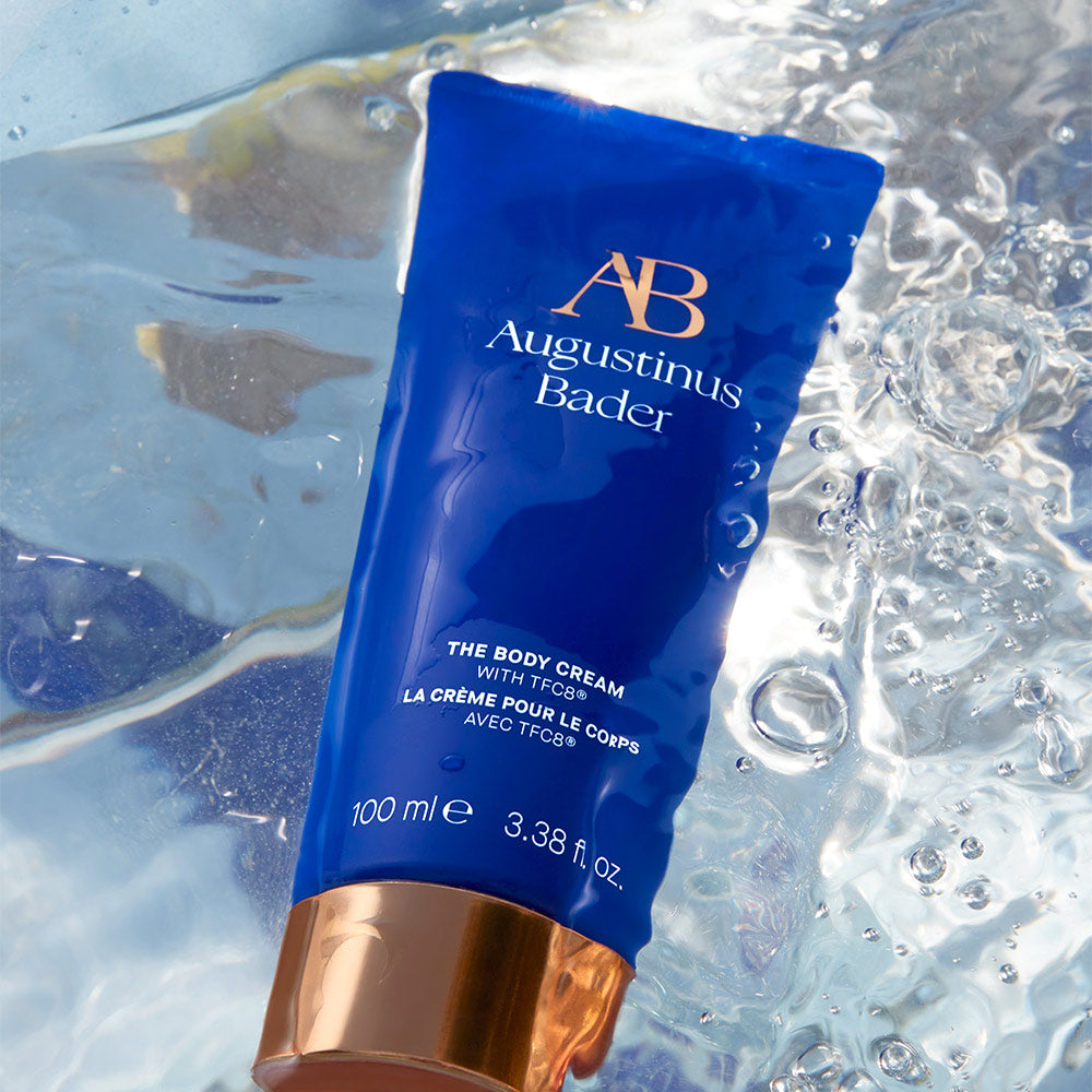 Augustinus Bader body cream inside of a clear gel-like substance