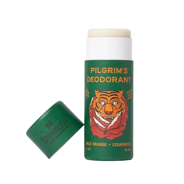 Green deodorant stick with tiger design on a white background