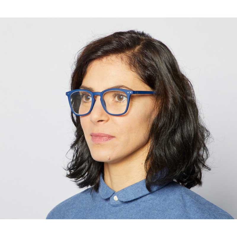 Woman wearing Izipizi Paris Reading Glasses # E - The Trapeze - Navy Blue 