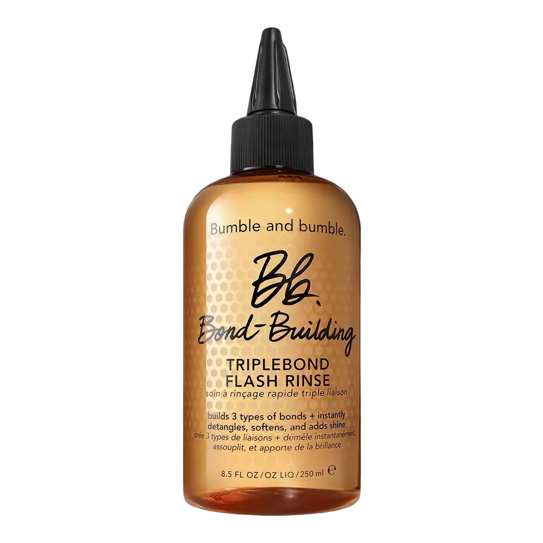 Bottle of Bumble and bumble Bond Building Triplebond Flash Rinse on a black background