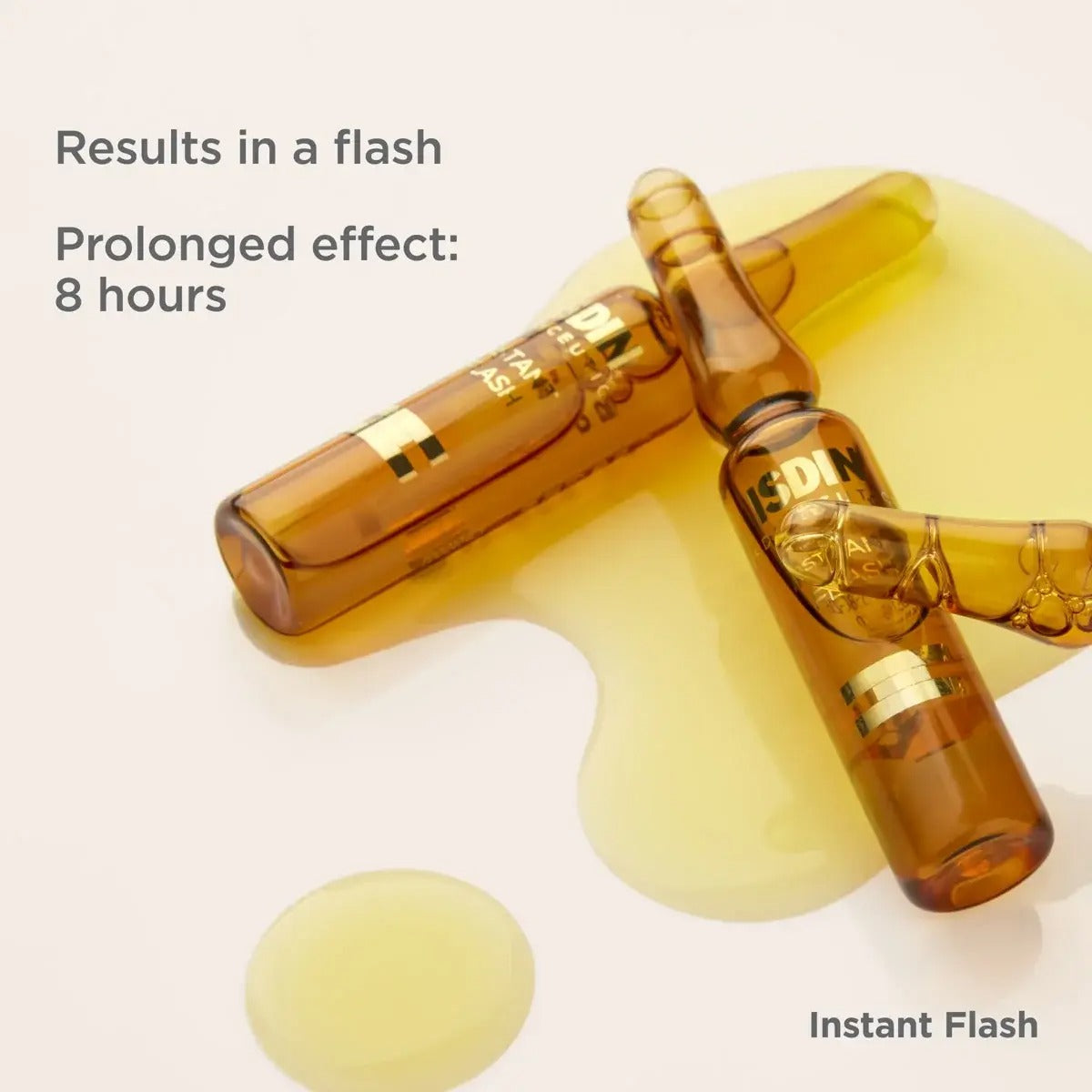 ISDINCEUTICS Instant Flash Ampoule bottles in poured-out product with text details