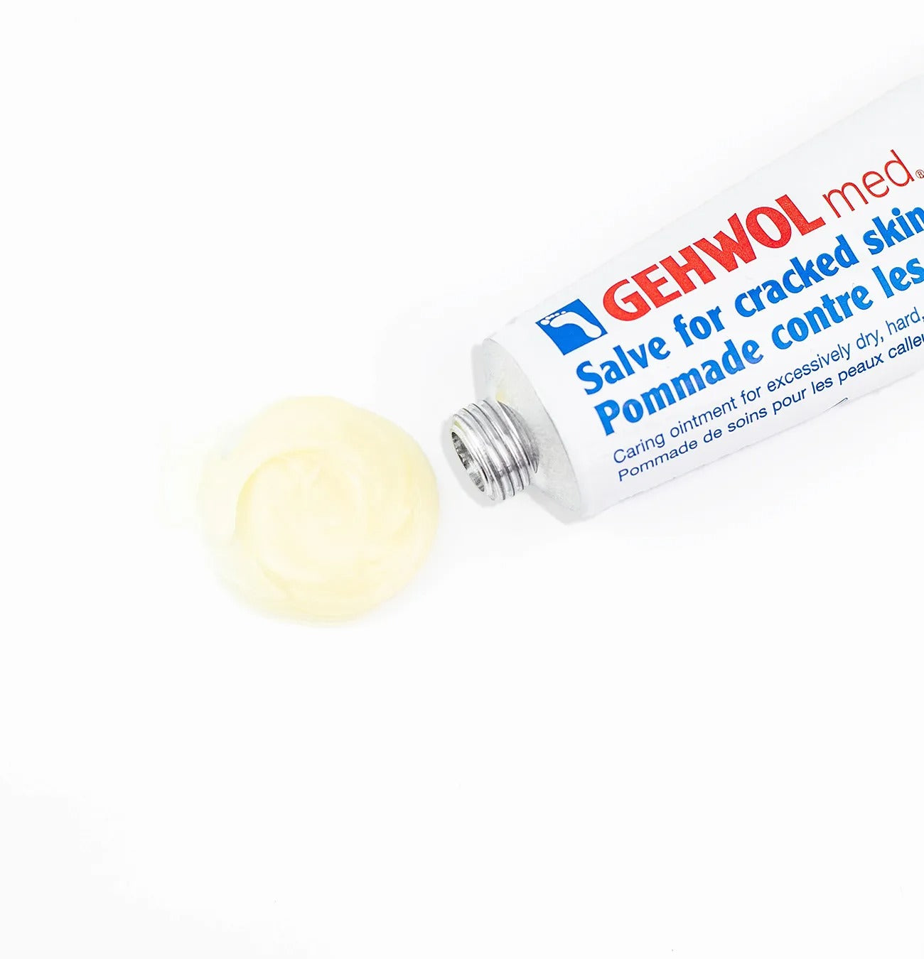 Product swatch next to a tube of GEHWOL med Salve for Cracked Skin.