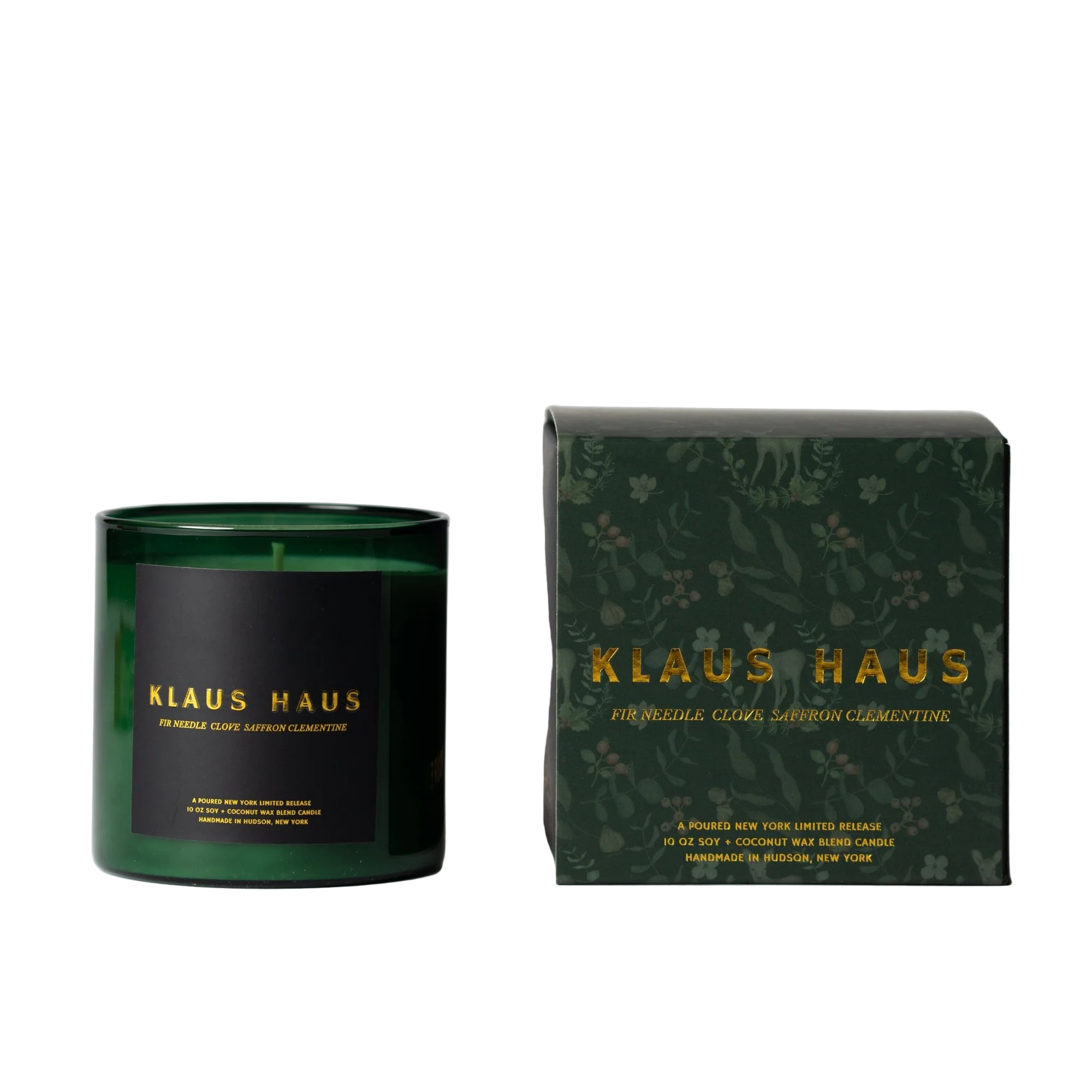 Green candle and packaging with 'Klaus Haus' branding on a light gray background