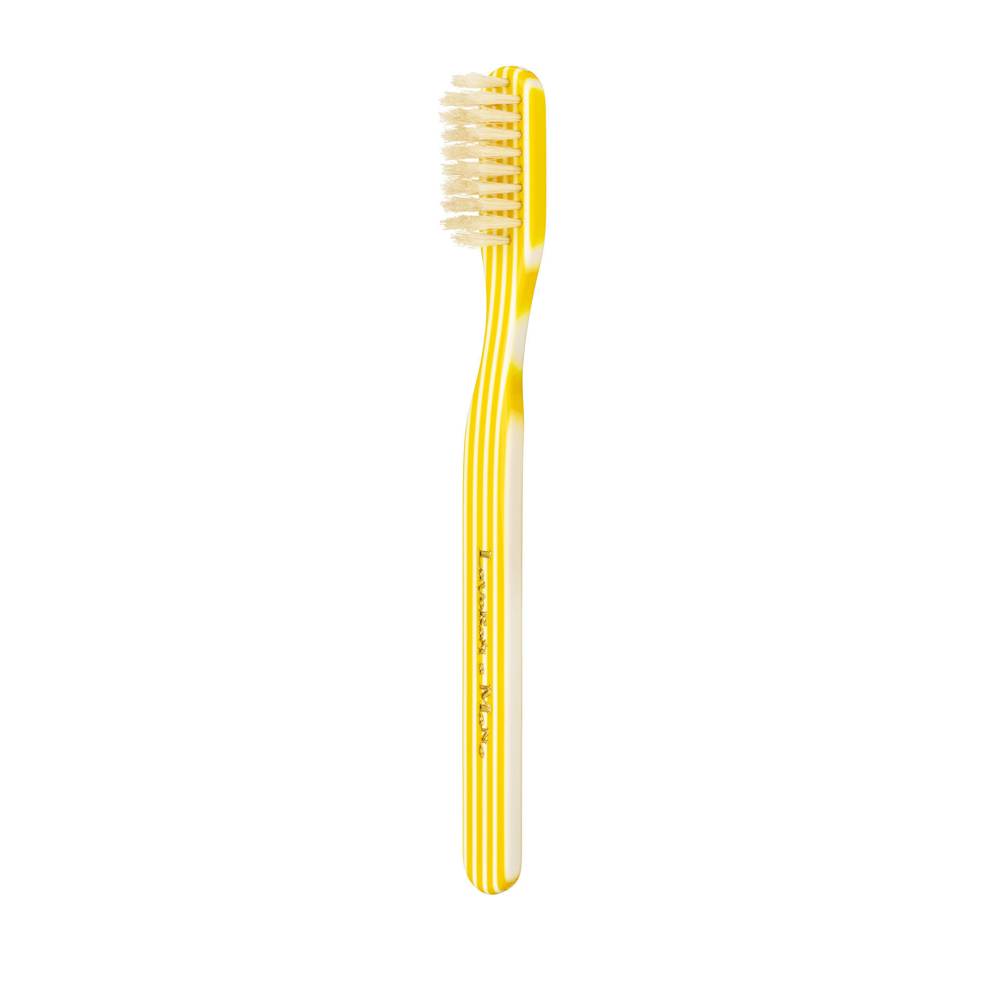 Yellow Capri Collection Toothbrush on a white background