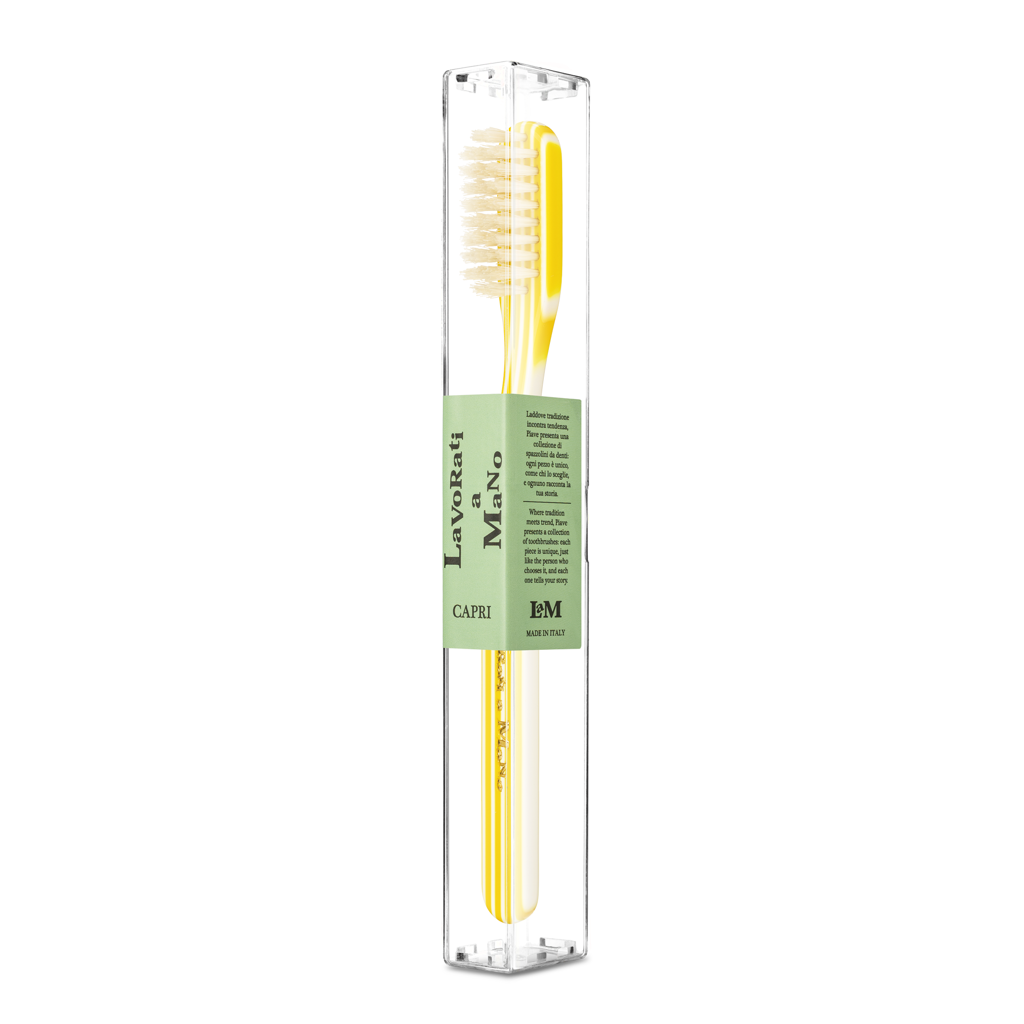 A yellow toothbrush in a clear cylindrical plastic case with a light green paper label on a white background