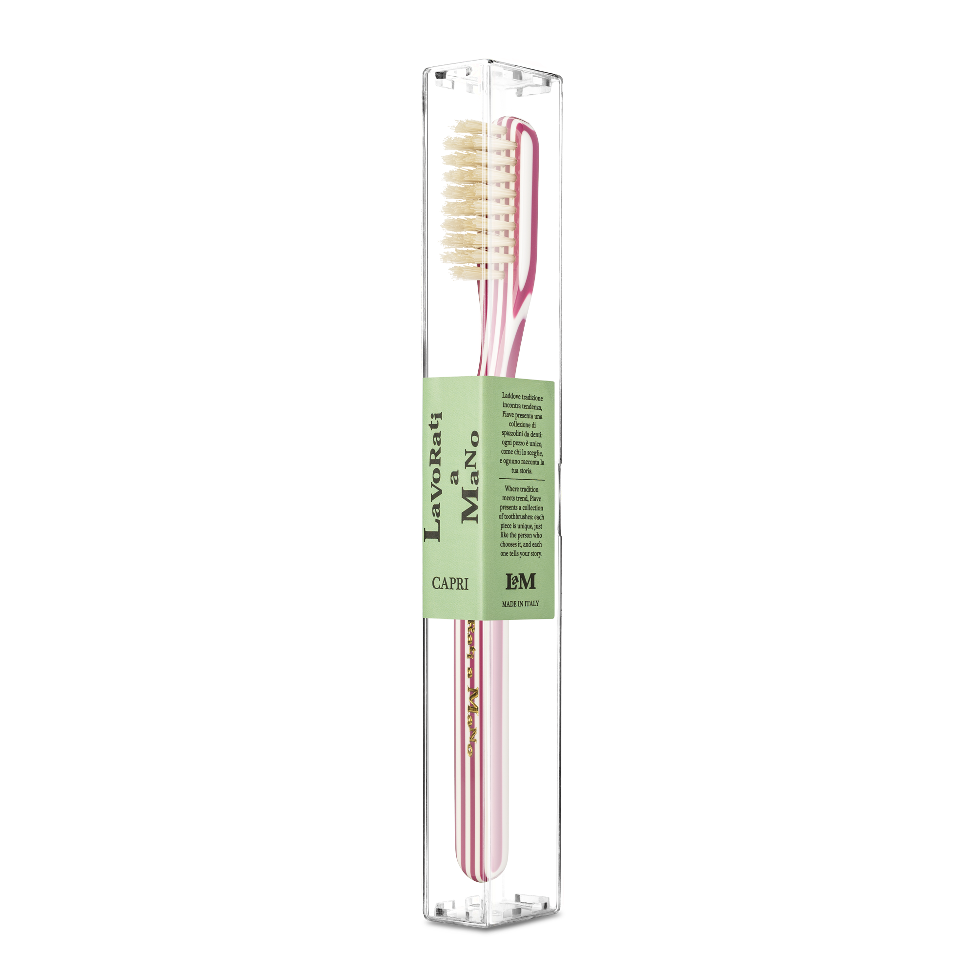 Magenta Capri Collection Toothbrush with pink bristles and a light green label, enclosed in a clear plastic vertical package on a white background.