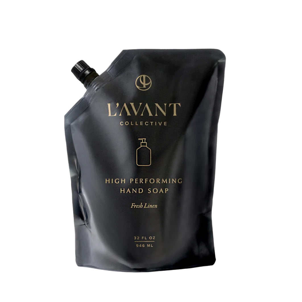 Black hand soap packaging with 'L'Avant Collective' branding on a white background
