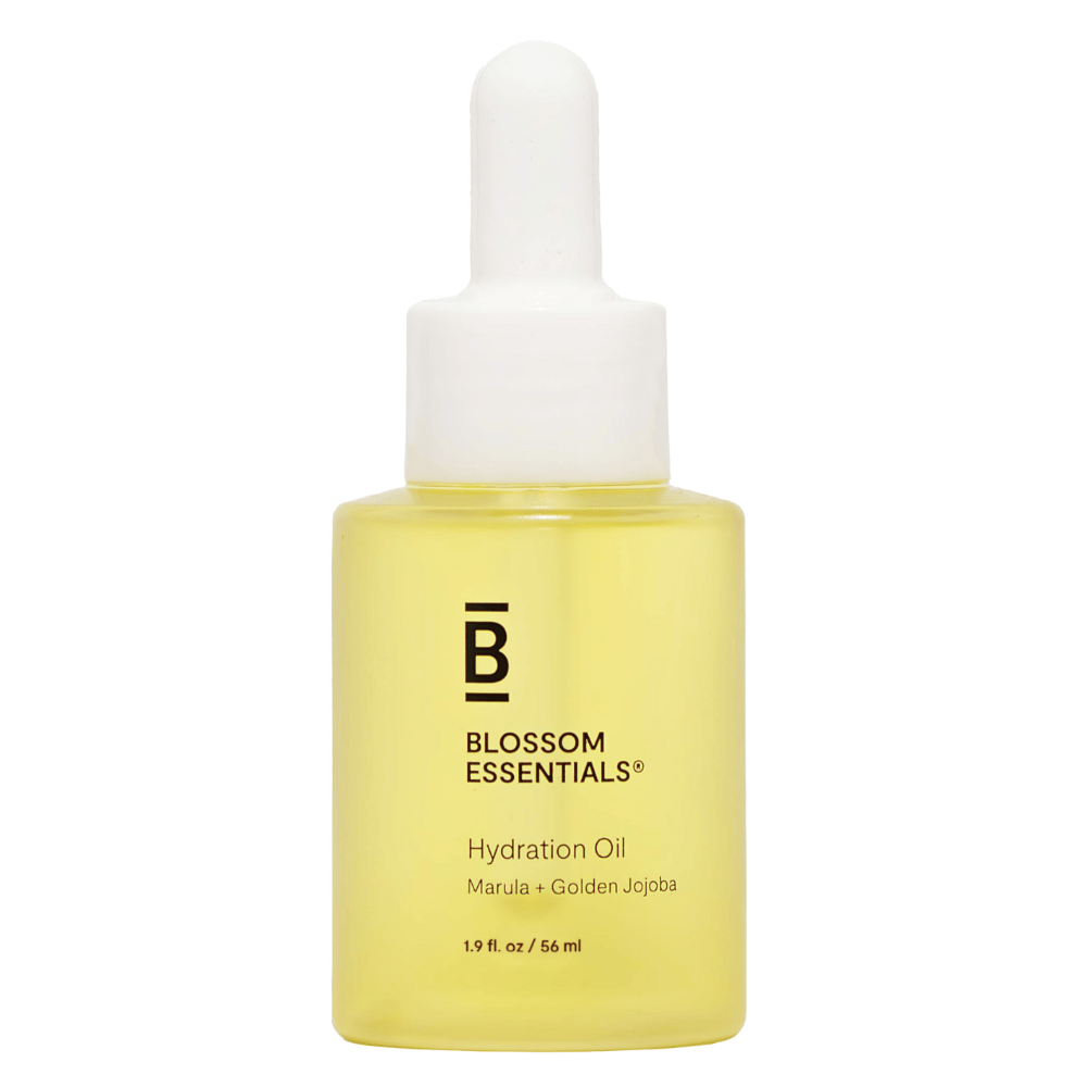 Yellow dropper bottle of Blossom Essentials Hydration Oil on a white background