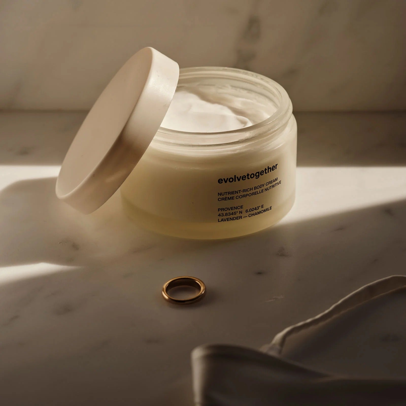 Evolvetogether Provence Body Cream on a marble surface