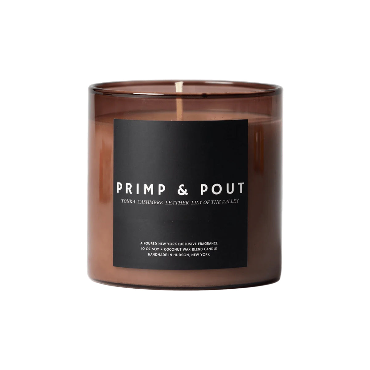 Candle with 'Primp & Pout' label on a white background