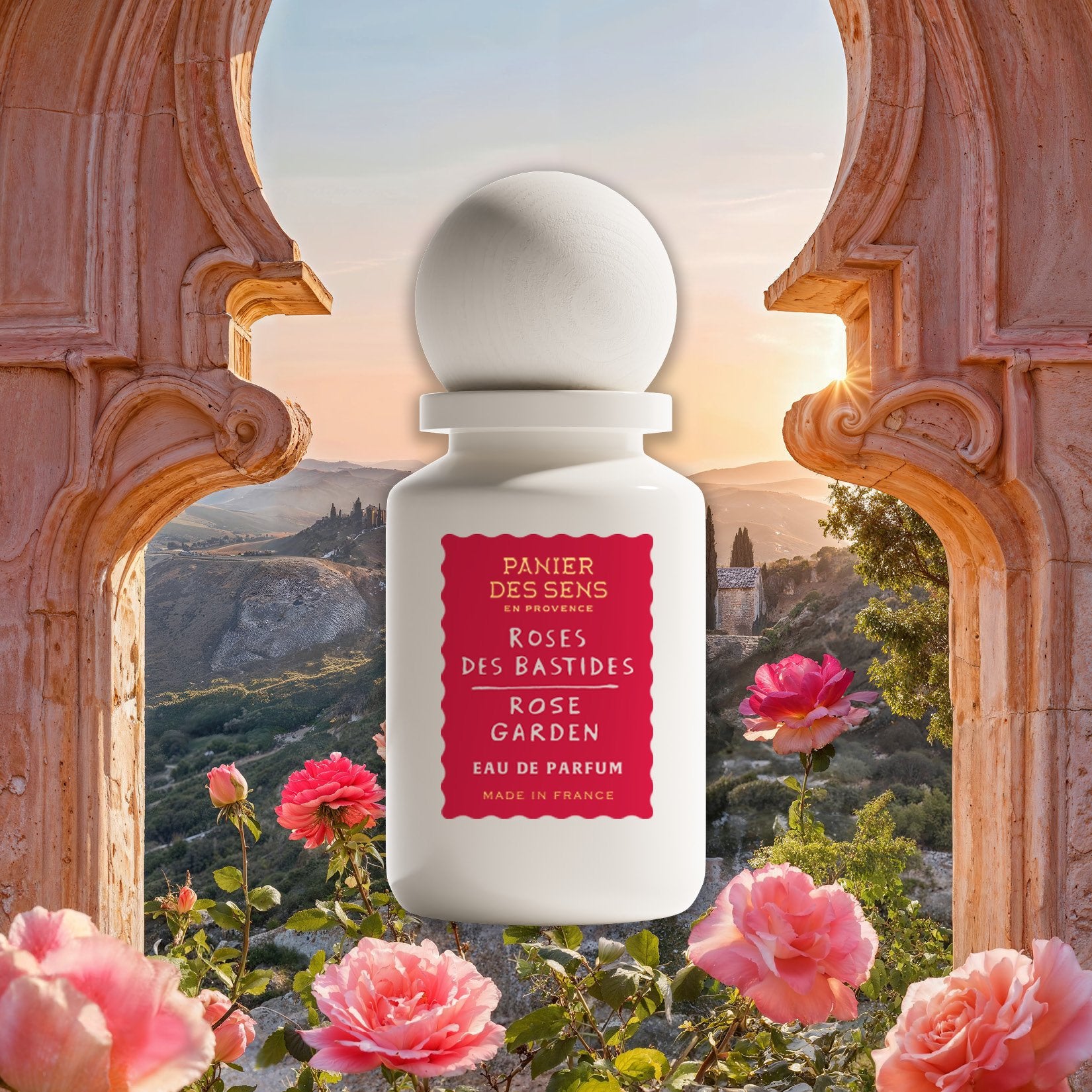 Rose Garden Perfume bottle with floral design against a scenic background